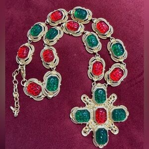 Elegant Gold Necklace with Red and Green Accents